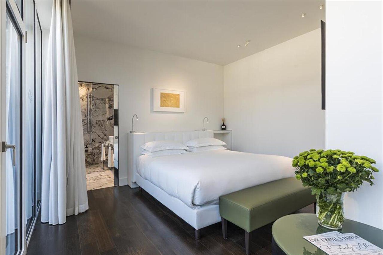 Magna Pars l'Hotel à Parfum Milano Esterno foto A room at the Hotel