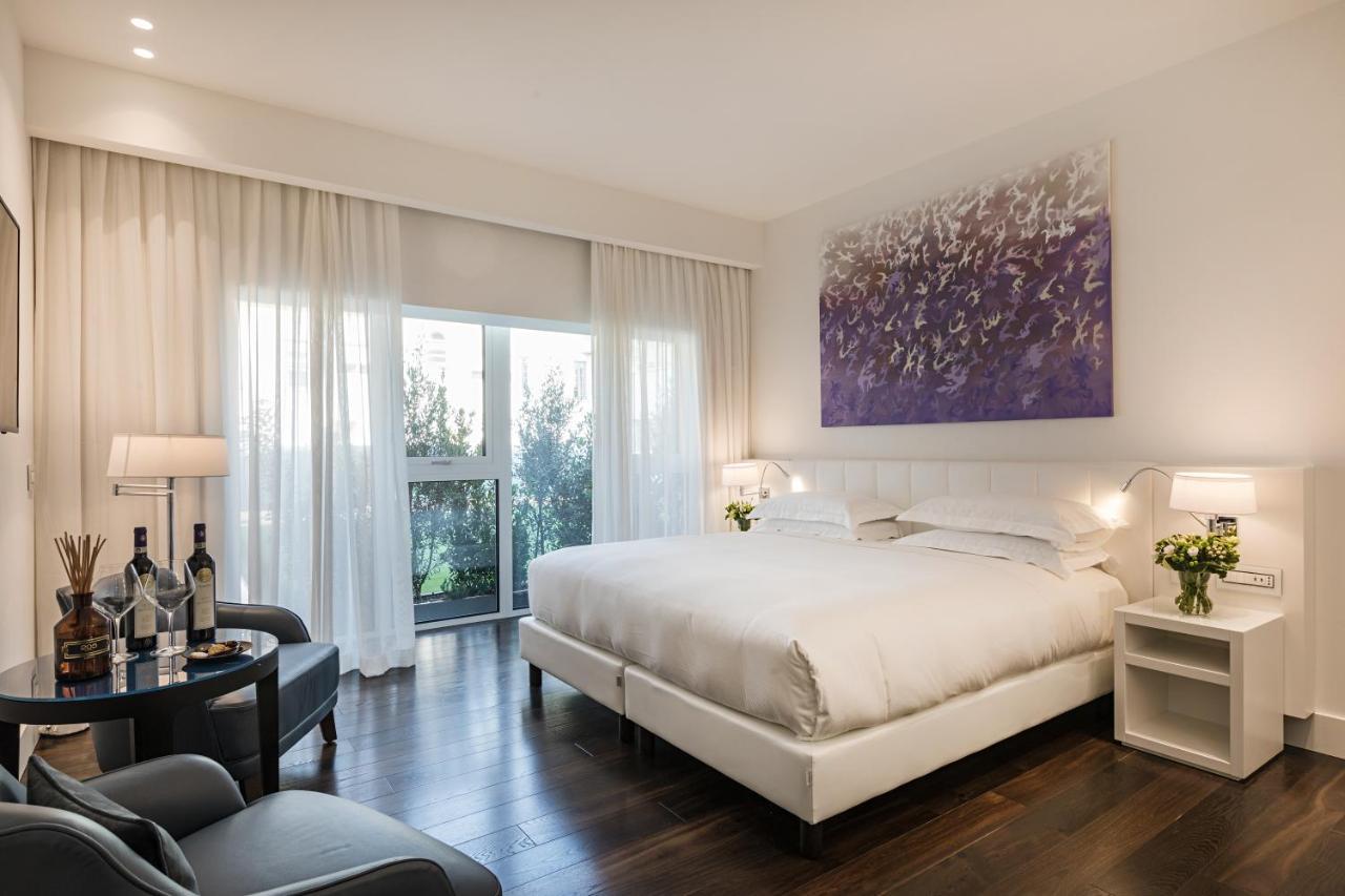 Magna Pars l'Hotel à Parfum Milano Esterno foto Deluxe room