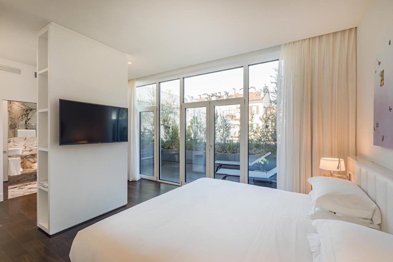 Magna Pars l'Hotel à Parfum Milano Esterno foto Deluxe room with terrace