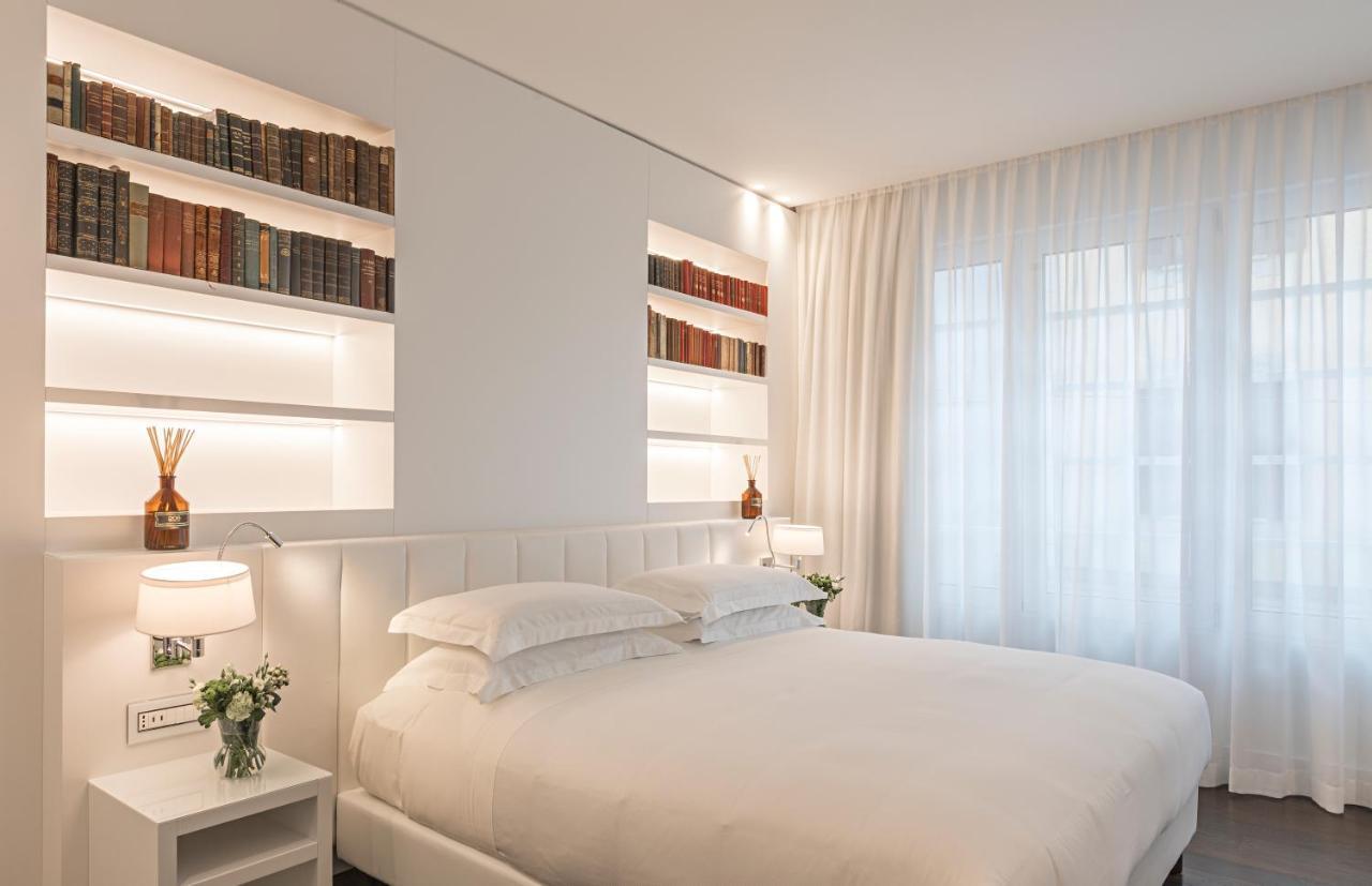 Magna Pars l'Hotel à Parfum Milano Esterno foto A room at the hotel